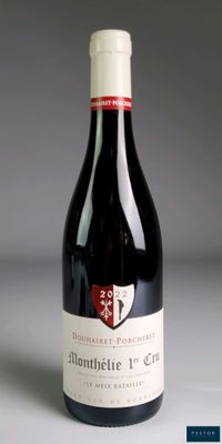 a bottle of wine that is sitting on a table