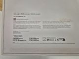 the back of a white box with a picture of a cell phone inside of it