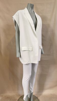 an image of a mannequin wearing a white vest and white pants