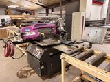 a picture of a machine that is working on a piece of metal
