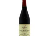 a bottle of wine that is sitting on a table