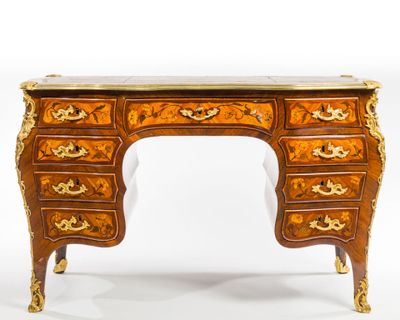 an image of a desk with drawers and a marble top