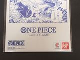 the one piece card game is on display on a table