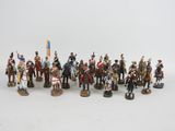 figurines de soldats à cheval portant des drapeaux