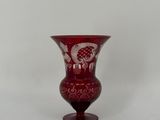 an image of a red glass vase on a white background