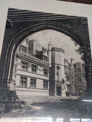 une photo d'un bâtiment sur lequel se trouve une horloge