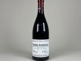 la bouteille de vin rouge est posée sur la table