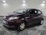 a picture of a purple car parked in a garage