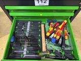 a green tool box with tools in it on display