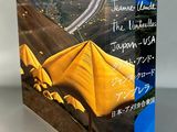 an image of a book with a picture of a yellow tent