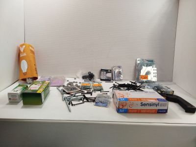 a white shelf with a bunch of items on it