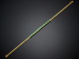 an emerald and diamond bracelet