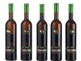 four bottles of wine sitting next to each other on a white surface