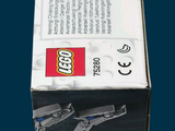 a box of legos sitting on a blue surface