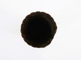 a black pipe that is sitting in the middle of the floor