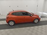 a red car parked in a garage with a checkered floor