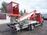 a red truck with a crane on the back of it