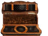 a wooden desk with a keyboard on top of it