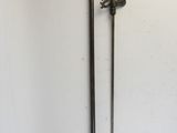 an old pair of swords hanging on a wall in a room