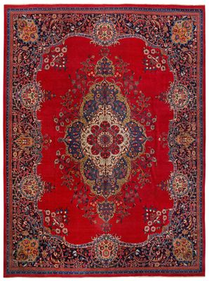 a red rug with a medallion design on it