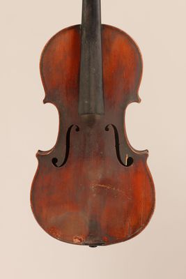 a close up of a violin with a bow on a white background