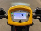 a close up of a motorcycle with a digital display on it