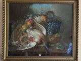 tableau encadré représentant une nature morte composée de fruits et de légumes posés sur une table