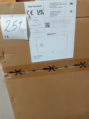 a cardboard box with a price tag on it sitting on the floor