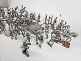 many figurines of soldiers that are on a table