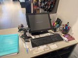a desktop computer sitting on a desk in a room