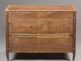 an old wooden chest with two drawers and a drawer underneath it