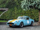 a blue and yellow sports car parked in a parking lot