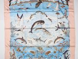 a picture of a scarf with dolphins, seagulls, and seagulls on it