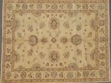 a beige and red rug with a floral design on it