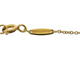 a close up of a gold chain with a clasp on it