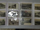 a display of old photographs on the wall