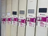 boxes and boxes are stacked on the floor in a storage room