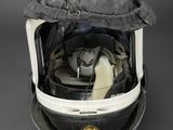 a helmet that has a bag on top of it
