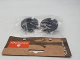 two plastic wheels in a package on a table