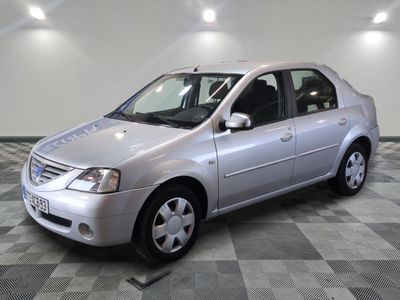a picture of a silver car parked in a garage