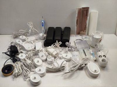 a lot of electronic devices that are sitting on a table