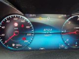 a close up of a car ' s dashboard with a speedometer