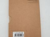 back of a pack of brown paper with a barcode on it