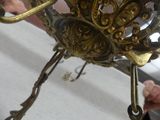 a large metal object with a bird on it