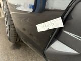 a sticker on the side of a car with a sticker attached to it
