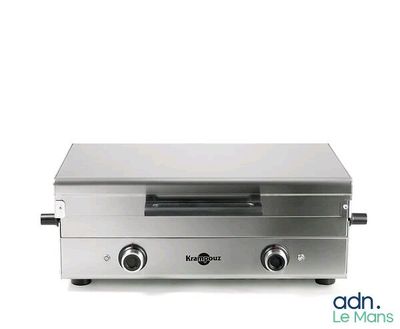 une image d'un grille-pain four sur fond blanc