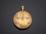 an image of a gold pocket watch on a black background