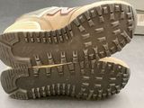 a close up of a pair of shoes on a table