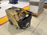 an image of a machine that is sitting on a pallet in a warehouse