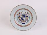 a plate with a blue and gold design on it